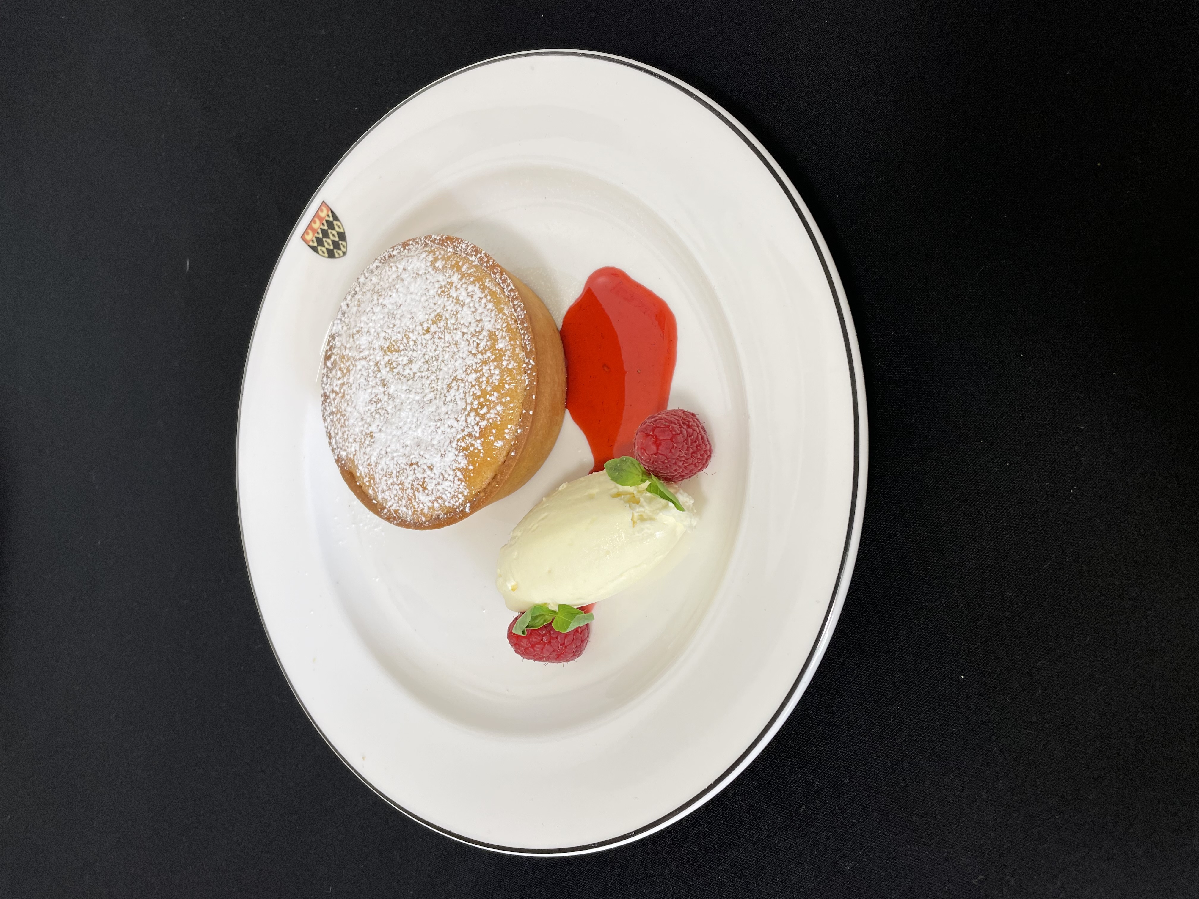 Bakewell tart served with raspberries, Disaronno and vanilla Chantilly